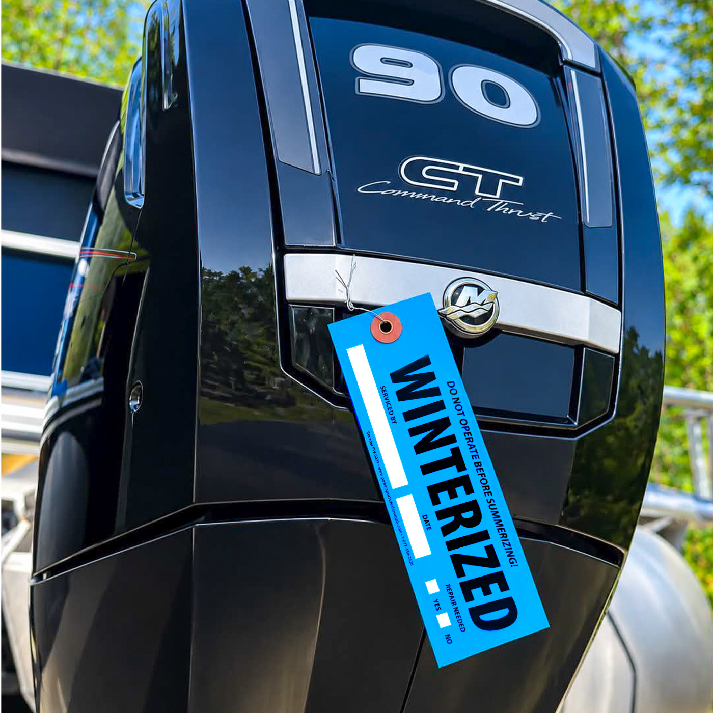 Blue Winterized Colored-Coded tag attached to boat motor