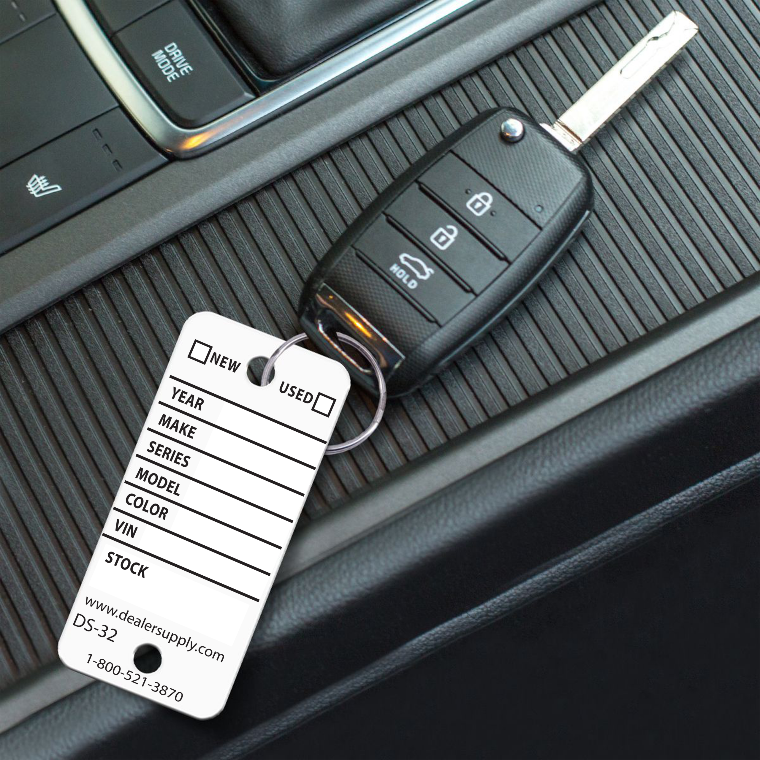 White Waterproof Rigid Vinyl Key Tag on Car Dealership Key Fob